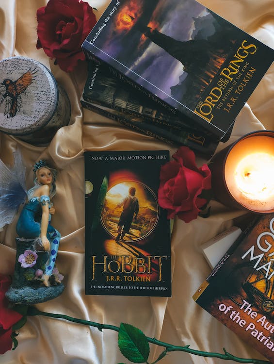 Lord of The Rings and The Hobbit books piled together